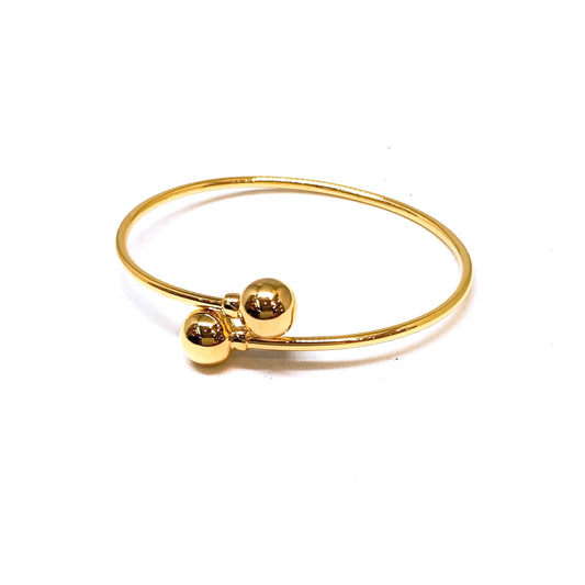 Polished Double Ball Hollow Twist Bangle - Oval